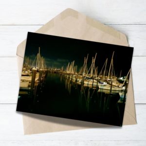 nightscape of the boat with yellow light half moon bay Auckland