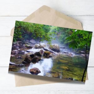 landscape of river with greener rock and water stream nz south island
