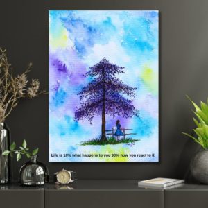 Purple Tree Painting with a girl standing and the quote 'Life is 10% what happens to us and 90% how we react to it